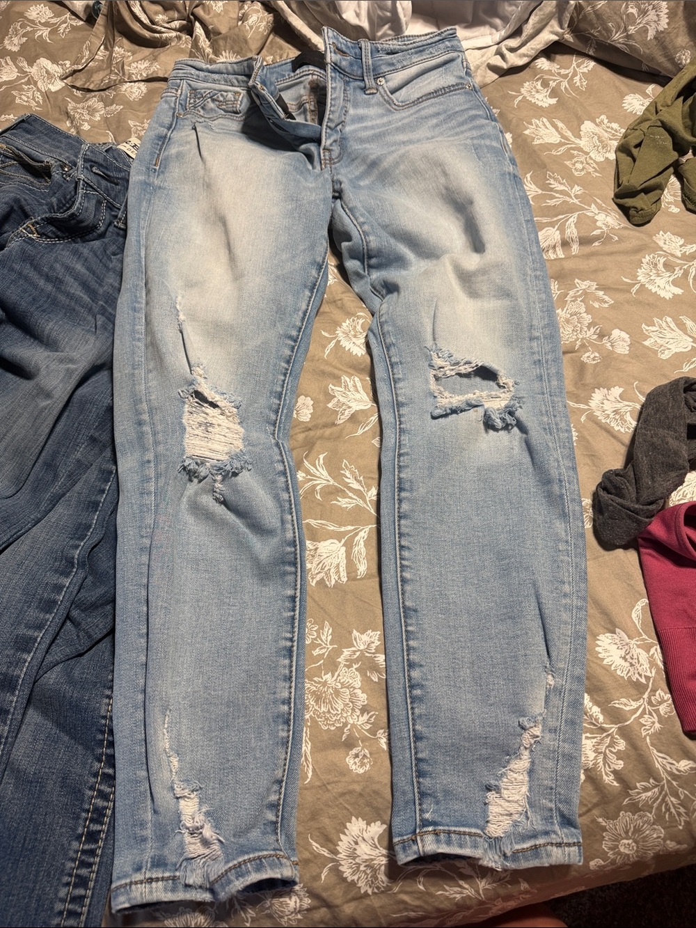 Buckle Light Blue Distressed Skinny Jeans